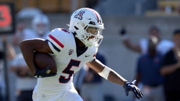 Sep 24, 2022; Berkeley, California, USA; Arizona Wildcats wide receiver Dorian Singer (5) runs after a catch against the California Golden Bears during the second quarter at FTX Field at California Memorial Stadium. Mandatory Credit: Darren Yamashita-USA TODAY Sports