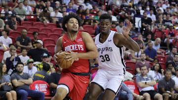 Daishen Nix #15 of the Houston Rockets drives against Darius Days #38 of the Miami Heat(Photo by Ethan Miller/Getty Images)