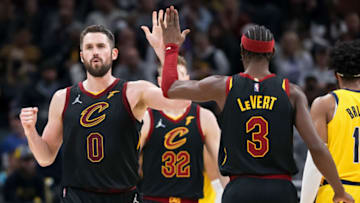 INDIANAPOLIS, INDIANA - FEBRUARY 11: Kevin Love #0 and Caris LeVert #3 of the Cleveland Cavaliers celebrate in the second quarter against the Indiana Pacers at Gainbridge Fieldhouse on February 11, 2022 in Indianapolis, Indiana. NOTE TO USER: User expressly acknowledges and agrees that, by downloading and or using this Photograph, user is consenting to the terms and conditions of the Getty Images License Agreement. (Photo by Dylan Buell/Getty Images)