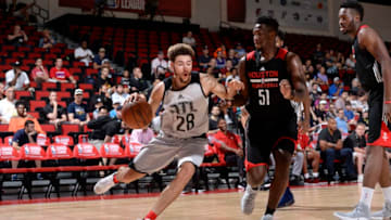 LAS VEGAS, NV - JULY 14: Isaia Cordinier #28 of the Atlanta Hawks handles the ball against the Houston Rockets during the 2017 Summer League on July 14, 2017 at the Cox Pavilion in Las Vegas, Nevada. NOTE TO USER: User expressly acknowledges and agrees that, by downloading and or using this Photograph, user is consenting to the terms and conditions of the Getty Images License Agreement. Mandatory Copyright Notice: Copyright 2017 NBAE (Photo by David Dow/NBAE via Getty Images)
