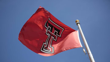 STILLWATER, OK - SEPTEMBER 25: The Texas Tech Red Raiders flag flies outside the stadium before the game against the Oklahoma State Cowboys September 25, 2014 at Boone Pickens Stadium in Stillwater, Oklahoma. The Cowboys defeated the Red Raiders 45-35. (Photo by Brett Deering/Getty Images)
