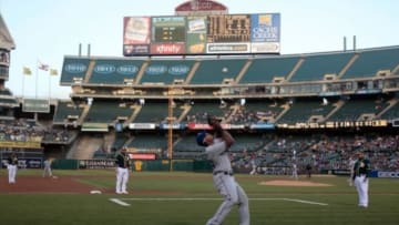 Jun 16, 2014; Oakland, CA, USA; Texas Rangers third baseman Adrian Beltre (29) catches the foul ball to end the inning with bases loaded against the Oakland Athletics during the second inning at O.co Coliseum. Mandatory Credit: Kelley L Cox-USA TODAY Sports