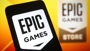 KIEV, UKRAINE - 2021/12/27: In this photo illustration, Epic Games logo of a video game and software developer is seen on a smartphone screen and in the background. (Photo Illustration by Pavlo Gonchar/SOPA Images/LightRocket via Getty Images)