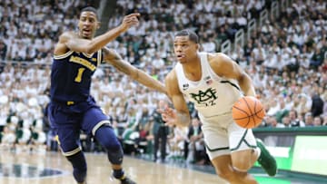 EAST LANSING, MI - JANUARY 13: Miles Bridges #22 of the Michigan State Spartans drives to the basket while defended by Charles Matthews #1 of the Michigan Wolverines at Breslin Center on January 13, 2018 in East Lansing, Michigan. (Photo by Rey Del Rio/Getty Images)