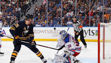 BUFFALO, NY - OCTOBER 6: Rasmus Dahlin #26 of the Buffalo Sabres shoots against Henrik Lundqvist #30 of the New York Rangers during an NHL game on October 6, 2018 at KeyBank Center in Buffalo, New York. (Photo by Bill Wippert/NHLI via Getty Images)