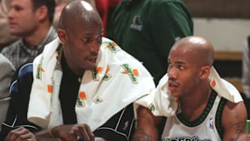 Kevin Garnett and Stephon Marbury talk things over. (Photo by MARLIN LEVISON/Star Tribune via Getty Images)
