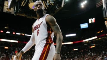 Mar 24, 2013; Miami, FL, USA; Miami Heat small forward LeBron James (6) reacts after a dunk against the Charlotte Bobcats in the second half at the American Airlines Arena. The Heat won 109-77. Mandatory Credit: Robert Mayer-USA TODAY Sports