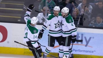 Jan 16, 2016; San Jose, CA, USA; Dallas Stars center Tyler Seguin (91) celebrates with left wing Jamie Benn (14) and defenseman Jason Demers (4) after a goal against the San Jose Sharks during the third period at SAP Center at San Jose. San Jose defeated Dallas 4-3. Mandatory Credit: Kelley L Cox-USA TODAY Sports