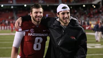 Nov 22, 2014; Fayetteville, AR, USA; Arkansas Razorbacks quarterbacks Austin Allen (8) and Brandon Allen after the game against the Ole Miss Rebels at Donald W. Reynolds Razorback Stadium. Arkansas defeated Mississippi 30-0. Mandatory Credit: Nelson Chenault-USA TODAY Sports