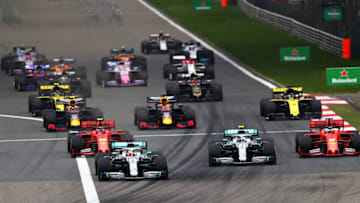 SHANGHAI, CHINA - APRIL 14: Lewis Hamilton of Great Britain driving the (44) Mercedes AMG Petronas F1 Team Mercedes W10 leads the field at the start during the F1 Grand Prix of China at Shanghai International Circuit on April 14, 2019 in Shanghai, China. (Photo by Dan Istitene/Getty Images)