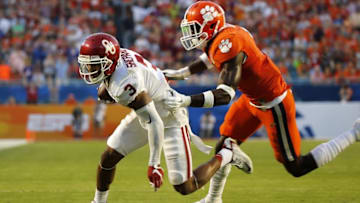 Dec 31, 2015; Miami Gardens, FL, USA; Oklahoma Sooners wide receiver Sterling Shepard (3) tries to pull away from Clemson Tigers safety Jayron Kearse (1) in the second quarter of the 2015 CFP Semifinal at the Orange Bowl at Sun Life Stadium. Mandatory Credit: Kim Klement-USA TODAY Sports
