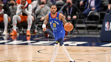 Monte Morris Denver Nuggets dribbles against the Phoenix Suns in Game 3 of the Western Conference second-round playoff series. Morris will be one of the NBA players to watch at the 2021 Tokyo Olympics. (Photo by Dustin Bradford/Getty Images)