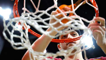 ATLANTA, GA - MARCH 24: Clayton Custer #13 of the Loyola Ramblers celebrates by cutting down the net after defeating the Kansas State Wildcats during the 2018 NCAA Men's Basketball Tournament South Regional at Philips Arena on March 24, 2018 in Atlanta, Georgia. Loyola defeated Kansas State 78-62 to advance to the Final Four. (Photo by Kevin C. Cox/Getty Images)
