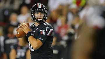 Oct 1, 2016; Cincinnati, OH, USA; Cincinnati Bearcats quarterback Ross Trail (12) looks to pass against the South Florida Bulls in the first half at Nippert Stadium. Mandatory Credit: Aaron Doster-USA TODAY Sports