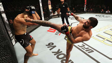 SAO PAULO, BRAZIL - SEPTEMBER 22: (R-L) Elizeu Zaleski dos Santos of Brazil kicks Luigi Vendramini of Brazil in their welterweight bout during the UFC Fight Night event at Ibirapuera Gymnasium on September 22, 2018 in Sao Paulo, Brazil. (Photo by Buda Mendes/Zuffa LLC/Zuffa LLC via Getty Images)