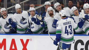 Oct 7, 2021; Edmonton, Alberta, CAN; Vancouver Canucks defensemen Quinn Hughes (43) celebrates a second permed goal against the Edmonton Oilers at Rogers Place. Mandatory Credit: Perry Nelson-USA TODAY Sports