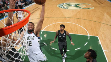 MILWAUKEE, WI - APRIL 5: Jabari Parker #12 of the Milwaukee Bucks dunks against the Brooklyn Nets on April 5, 2018 at the BMO Harris Bradley Center in Milwaukee, Wisconsin. NOTE TO USER: User expressly acknowledges and agrees that, by downloading and or using this Photograph, user is consenting to the terms and conditions of the Getty Images License Agreement. Mandatory Copyright Notice: Copyright 2018 NBAE (Photo by Gary Dineen/NBAE via Getty Images)