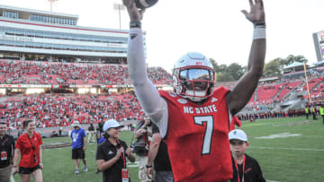 Oct 28, 2023; Raleigh, North Carolina, USA; North Carolina State quarterback MJ Morris (7) celebrates after a game against the Clemson Tigers at Carter-Finley Stadium. North Carolina State won 24-17. Mandatory Credit: Ken Ruinard-USA TODAY Sports