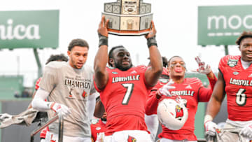 Dec 17, 2022; Boston, MA, USA; Louisville Cardinals linebacker Monty Montgomery (7) celebrates winning the Wasabi Bowl at Fenway Park. Mandatory Credit: Eric Canha-USA TODAY Sports