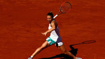PARIS, FRANCE - JUNE 10: Simona Halep of Romania plays a forehand during the ladies singles final match against Jelena Ostapenko of Latvia Open at Roland Garros on June 10, 2017 in Paris, France. (Photo by Adam Pretty/Getty Images)