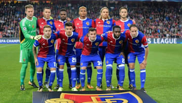 FC Basel's players, (back row, LtoR) Czech goalkeeper Tomas Vaclik, Czech defender Marek Suchy, Swiss forward Dimitri Oberlin, Swiss defender Manuel Akanji, Swiss defender Michael Lang and Dutch forward Ricky van Wolfswinkel and (front row, LtoR) Swiss midfielder Renato Steffen, Italian defender Raoul Petretta, Swiss midfielder Taulant Xhaka, Colombian defender Eder Balanta and Swiss midfielder Luca Zuffi pose for a team photo prior to the UEFA Champions League Group A football match between FC Basel 1893 and SL Benfica on September 27, 2017 at the St Jakob-Park Stadium in Basel. / AFP PHOTO / Fabrice COFFRINI (Photo credit should read FABRICE COFFRINI/AFP/Getty Images)