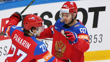 Russia's Artemy Panarin (L) and Yevgeny Dadonov celebrate scoring in the 2016 IIHF World Championship bronze medal ice hockey match against the United States at VTB Ice Palace in Moscow, Russia, May 22, 2016. Artyom Korotayev/TASS (Photo by Artyom KorotayevTASS via Getty Images)