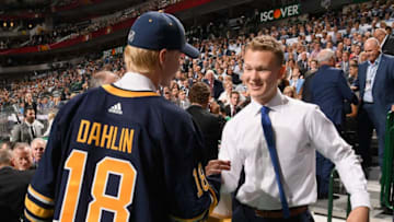 DALLAS, TX - JUNE 22: Rasmus Dahlin, selected first overall by the Buffalo Sabres, congratulates fellow draftee Brady Tkachuk (R), selected fourth overall by the Ottawa Senators, during the first round of the 2018 NHL Draft at American Airlines Center on June 22, 2018 in Dallas, Texas. (Photo by Brian Babineau/NHLI via Getty Images)
