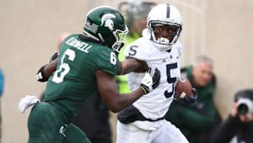 EAST LANSING, MI - NOVEMBER 04: DaeSean Hamilton #5 of the Penn State Nittany Lions runs past David Dowell #6 of the Michigan State Spartans for a first half touchdown at Spartan Stadium on November 4, 2017 in East Lansing, Michigan. (Photo by Gregory Shamus/Getty Images)