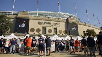 CHICAGO, ILLINOIS - SEPTEMBER 19: Chicago Bears fans enter the stadium before the game between the Chicago Bears and the Cincinnati Bengals at Soldier Field on September 19, 2021 in Chicago, Illinois. (Photo by Quinn Harris/Getty Images)