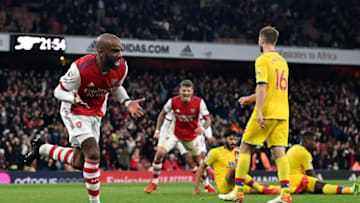 Arsenal's French striker Alexandre Lacazette celebrates scoring his team's second goal during the English Premier League football match between Arsenal and Crystal Palace at the Emirates Stadium in London on October 18, 2021. - - RESTRICTED TO EDITORIAL USE. No use with unauthorized audio, video, data, fixture lists, club/league logos or 'live' services. Online in-match use limited to 120 images. An additional 40 images may be used in extra time. No video emulation. Social media in-match use limited to 120 images. An additional 40 images may be used in extra time. No use in betting publications, games or single club/league/player publications. (Photo by Glyn KIRK / AFP) / RESTRICTED TO EDITORIAL USE. No use with unauthorized audio, video, data, fixture lists, club/league logos or 'live' services. Online in-match use limited to 120 images. An additional 40 images may be used in extra time. No video emulation. Social media in-match use limited to 120 images. An additional 40 images may be used in extra time. No use in betting publications, games or single club/league/player publications. / RESTRICTED TO EDITORIAL USE. No use with unauthorized audio, video, data, fixture lists, club/league logos or 'live' services. Online in-match use limited to 120 images. An additional 40 images may be used in extra time. No video emulation. Social media in-match use limited to 120 images. An additional 40 images may be used in extra time. No use in betting publications, games or single club/league/player publications. (Photo by GLYN KIRK/AFP via Getty Images)