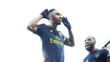 NORWICH, ENGLAND - DECEMBER 01: Pierre-Emerick Aubameyang of Arsenal celebrates scoring the re taken penalty during the Premier League match between Norwich City and Arsenal FC at Carrow Road on December 01, 2019 in Norwich, United Kingdom. (Photo by Julian Finney/Getty Images)