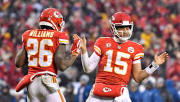 Kansas City Chiefs quarterback Patrick Mahomes (15) celebrates with running back Damien Williams after Mahomes scored on a dive into the end zone late in the second quarter against the Indianapolis Colts during an AFC Divisional game on Saturday, Jan. 12, 2019, at Arrowhead Stadium in Kansas City, Mo. The Chiefs advanced, 31-13. (John Sleezer/Kansas City Star/TNS via Getty Images)