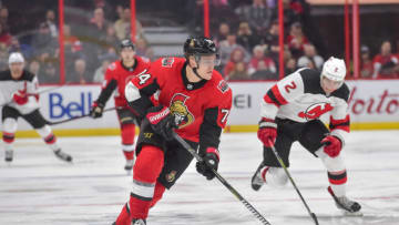 OTTAWA, ON - FEBRUARY 06: Ottawa Senators Defenceman Mark Borowiecki (74) stickhandles the puck as New Jersey Devils Defenceman John Moore (2) gives chase during the second period of the NHL game between the Ottawa Senators and the New Jersey Devils on Feb. 6, 2018 at the Canadian Tire Centre in Ottawa, Ontario, Canada. (Photo by Steven Kingsman/Icon Sportswire via Getty Images)