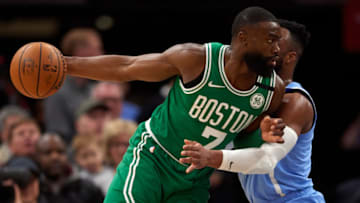 MINNEAPOLIS, MINNESOTA - FEBRUARY 21: Josh Okogie #20 of the Minnesota Timberwolves defends against Jaylen Brown #7 of the Boston Celtics. (Photo by Hannah Foslien/Getty Images)