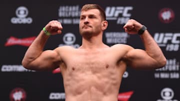 CURITIBA, BRAZIL - MAY 13: Stipe Miocic steps on the scale during the UFC 198 weigh-in at Arena da Baixada stadium on May 13, 2016 in Curitiba, Parana, Brazil. (Photo by Josh Hedges/Zuffa LLC/Zuffa LLC via Getty Images)