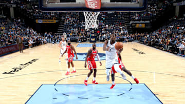 MEMPHIS, TN - OCTOBER 12: Jaren Jackson Jr. #13 of the Memphis Grizzlies shoots the ball against the Houston Rockets during a pre-season game on October 12, 2018 at FedExForum in Memphis, Tennessee. Copyright 2018 NBAE (Photo by Joe Murphy/NBAE via Getty Images)