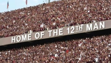 Sep 14, 2013; College Station, TX, USA; Texas A&M Aggies fans sing the Aggie War Hymn against the Alabama Crimson Tide during the second half at Kyle Field. Alabama won 49-42. Mandatory Credit: Thomas Campbell-USA TODAY Sports