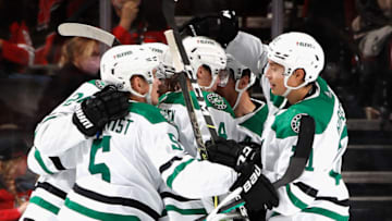 NEWARK, NEW JERSEY - DECEMBER 13: The Dallas Stars celebrate a goal by Roope Hintz #24 against the New Jersey Devils at 19:57 of the second period at the Prudential Center on December 13, 2022 in Newark, New Jersey. (Photo by Bruce Bennett/Getty Images)