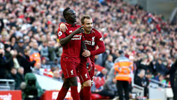 LIVERPOOL, ENGLAND - OCTOBER 27: Sadio Mane of Liverpool celebrates with teammate Xherdan Shaqiri after scoring his team's fourth goal during the Premier League match between Liverpool FC and Cardiff City at Anfield on October 27, 2018 in Liverpool, United Kingdom. (Photo by Jan Kruger/Getty Images)