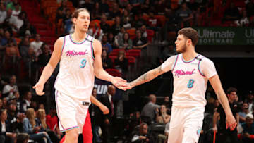 MIAMI, FL - MARCH 10: Tyler Johnson #8 and Kelly Olynyk #9 of the Miami Heat high five during the game against the Washington Wizards on March 10, 2018 at American Airlines Arena in Miami, Florida. NOTE TO USER: User expressly acknowledges and agrees that, by downloading and or using this Photograph, user is consenting to the terms and conditions of the Getty Images License Agreement. Mandatory Copyright Notice: Copyright 2018 NBAE (Photo by Issac Baldizon/NBAE via Getty Images)