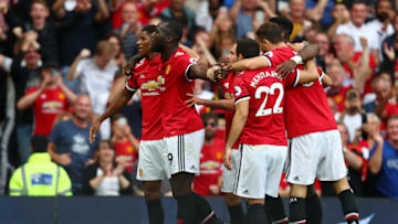 MANCHESTER, ENGLAND - AUGUST 13: Romelu Lukaku of Manchester United celebrates scoring his sides first goal with his Manchester United team mates during the Premier League match between Manchester United and West Ham United at Old Trafford on August 13, 2017 in Manchester, England. (Photo by Dan Istitene/Getty Images)