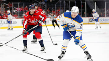 Sep 24, 2023; Washington, District of Columbia, USA; Buffalo Sabres forward Jiri Kulich (20) controls the puck in front of Washington Capitals defenseman Vincent Iorio (2) during the second period at Capital One Arena. Mandatory Credit: Amber Searls-USA TODAY Sports