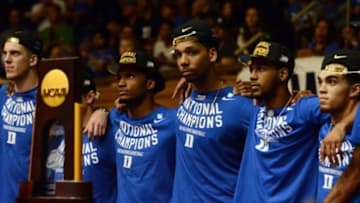 Apr 7, 2015; Durham, NC, USA; Duke Blue Devils players listen to head coach Mike Krzyzewski (not pictured) speak during a welcome home ceremony at Cameron Indoor Stadium. Mandatory Credit:Rob Kinnan-USA TODAY Sports