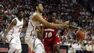 Feb 10, 2015; Lincoln, NE, USA; Wisconsin Badgers forward Nigel Hayes (10) drives into Nebraska Cornhuskers forward Walter Pitchford (35) in the second half at Pinnacle Bank Arena. Wisconsin won 65-55. Mandatory Credit: Bruce Thorson-USA TODAY Sports