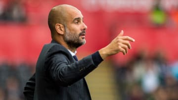 SWANSEA, WALES - SEPTEMBER 24: Manager of Manchester City, Josep Guardiola reacts during the Premier League match between Swansea City and Manchester City at The Liberty Stadium on September 24, 2016 in Swansea, Wales. (Photo by Athena Pictures/Getty Images)