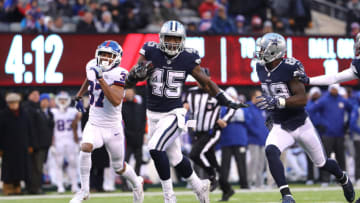EAST RUTHERFORD, NEW JERSEY - DECEMBER 10: Rod Smith #45 of the Dallas Cowboys scores an 81 yard touchdown against the New York Giants during the fourth quarter in the game at MetLife Stadium on December 10, 2017 in East Rutherford, New Jersey. (Photo by Elsa/Getty Images)