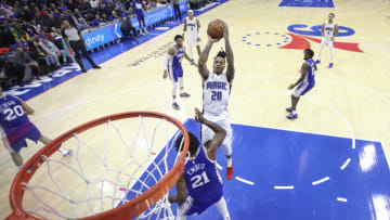 PHILADELPHIA, PENNSYLVANIA - FEBRUARY 01: Markelle Fultz #20 of the Orlando Magic shoots over Joel Embiid #21 of the Philadelphia 76ers at Wells Fargo Center on February 01, 2023 in Philadelphia, Pennsylvania. NOTE TO USER: User expressly acknowledges and agrees that, by downloading and or using this photograph, User is consenting to the terms and conditions of the Getty Images License Agreement. (Photo by Tim Nwachukwu/Getty Images)
