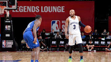 LAS VEGAS, NV - JULY 15: Jevon Carter #3 of the Memphis Grizzlies handles the ball against the Philadelphia 76ers during the 2018 Las Vegas Summer League on July 15, 2018 at the Thomas & Mack Center in Las Vegas, Nevada. NOTE TO USER: User expressly acknowledges and agrees that, by downloading and/or using this photograph, user is consenting to the terms and conditions of the Getty Images License Agreement. Mandatory Copyright Notice: Copyright 2018 NBAE (Photo by David Dow/NBAE via Getty Images)