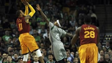 Jan 13, 2016; Boston, MA, USA; Indiana Pacers guard Monta Ellis (11) shoots the ball over Boston Celtics guard Isaiah Thomas (4) during the first half at TD Garden. Mandatory Credit: Bob DeChiara-USA TODAY Sports