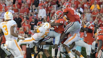 Oct 1, 2016; Athens, GA, USA; Tennessee Volunteers wide receiver Jauan Jennings (15) catches a game winning touchdown pass in front of Georgia Bulldogs safety Dominick Sanders (24) on the last play on the game during the fourth quarter at Sanford Stadium. Tennessee defeated Georgia 34-31. Mandatory Credit: Dale Zanine-USA TODAY Sports